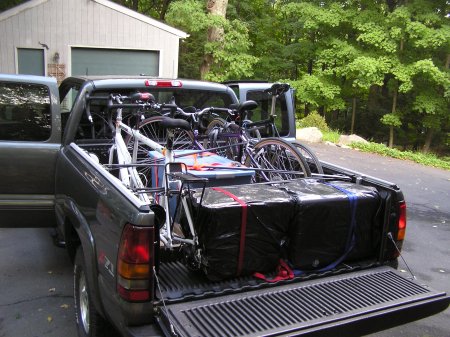 Truck loaded with bicycles and stuff